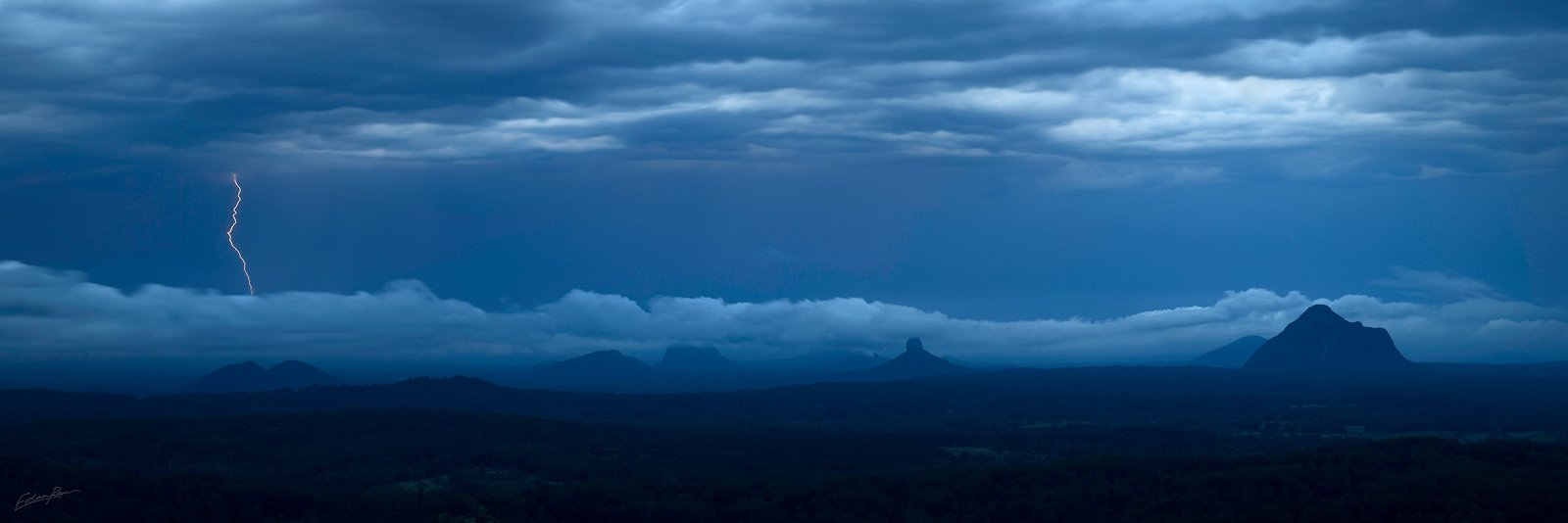 glass house mountain storm photo